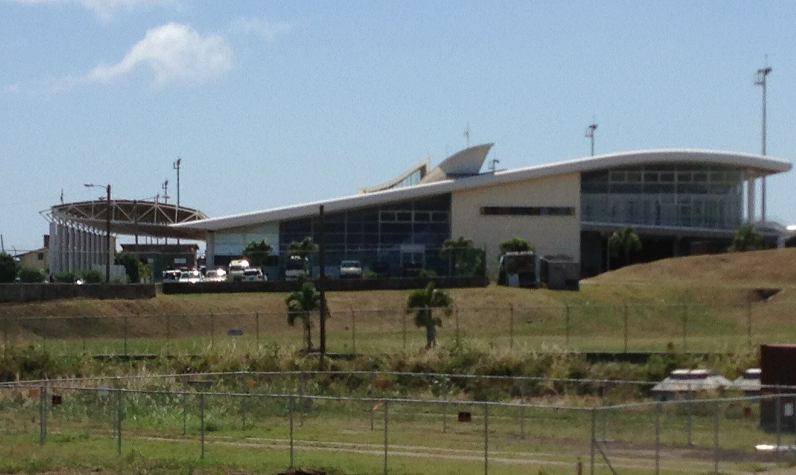 The terminal building at Robert L. Bradshaw International Airport, with its curved white roof